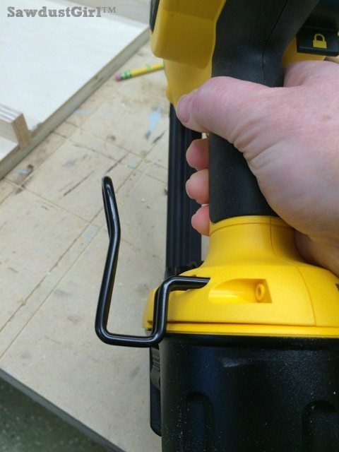 How to Choose a Nail Gun to Buy in 2021 - Belt hanger on DeWalt cordless nail gun